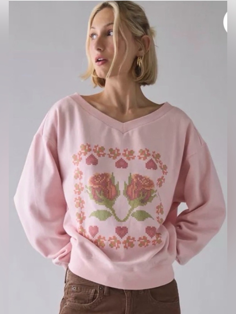 Urban Outfitters UO Cross Stitch
Graphic V-Neck Pullover Sweatshirt. NWOT. Rose